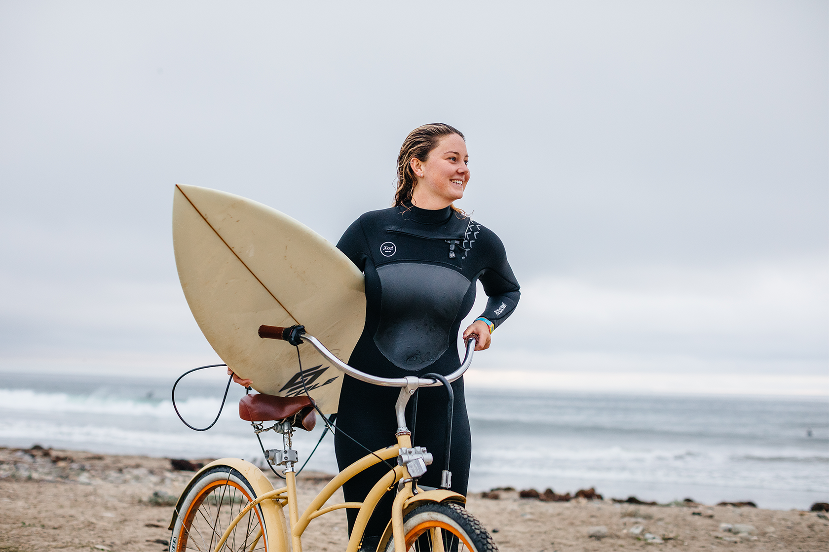 Surfer girl on the beach